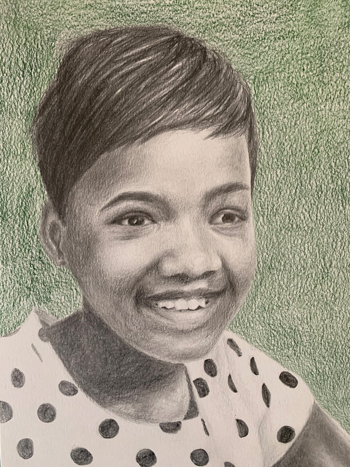 PINKY: Pinky, 12, of India, in graphite and colored pencil, created by Cranston High School East rising senior Mathilda Corcoran, under the direction of Jill Cyr, National Art Honor Society chapter sponsor. Corcoran shared that she found the process of creating the portrait comfortable and relaxing.